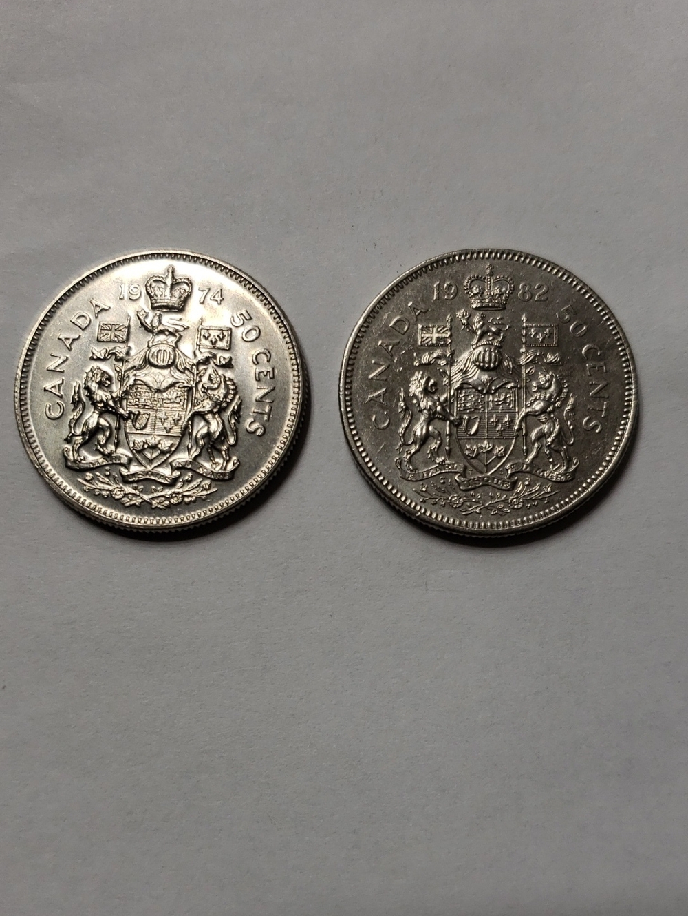 Canadian 50 Cent Coin Pair in Silver Tone - 1974 & 1982